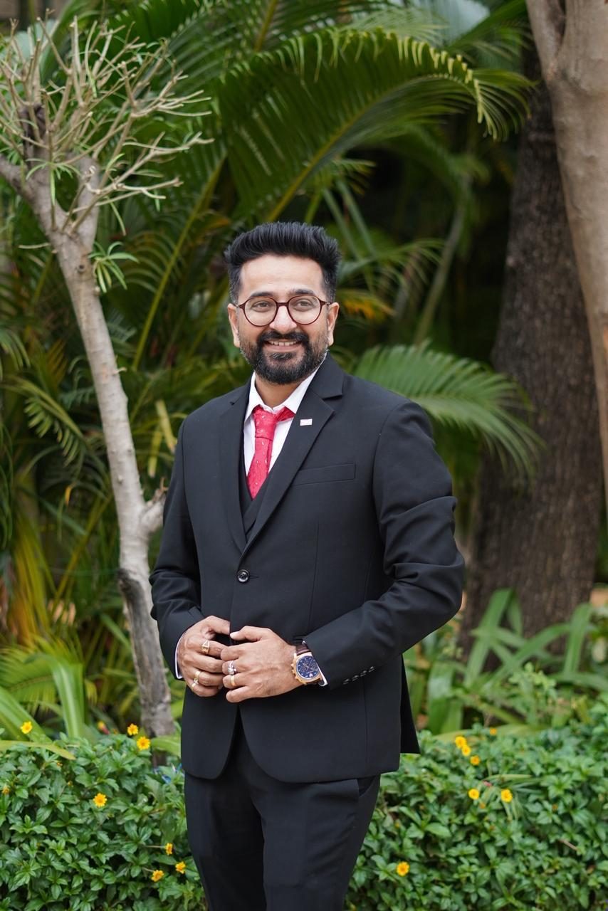 Adhir Karia, Founder & Managing Director